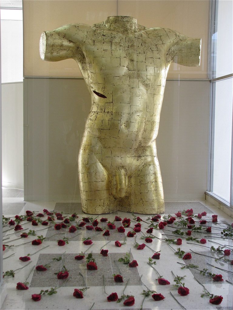 BODY AND BLOOD OF CHRIST, 2004, imitation gold leaf, styrofoam, roses, 10’