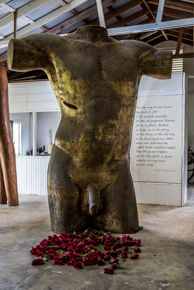 BODY AND BLOOD OF CHRIST, 2004, imitation gold leaf, styrofoam, roses, poem, 10’