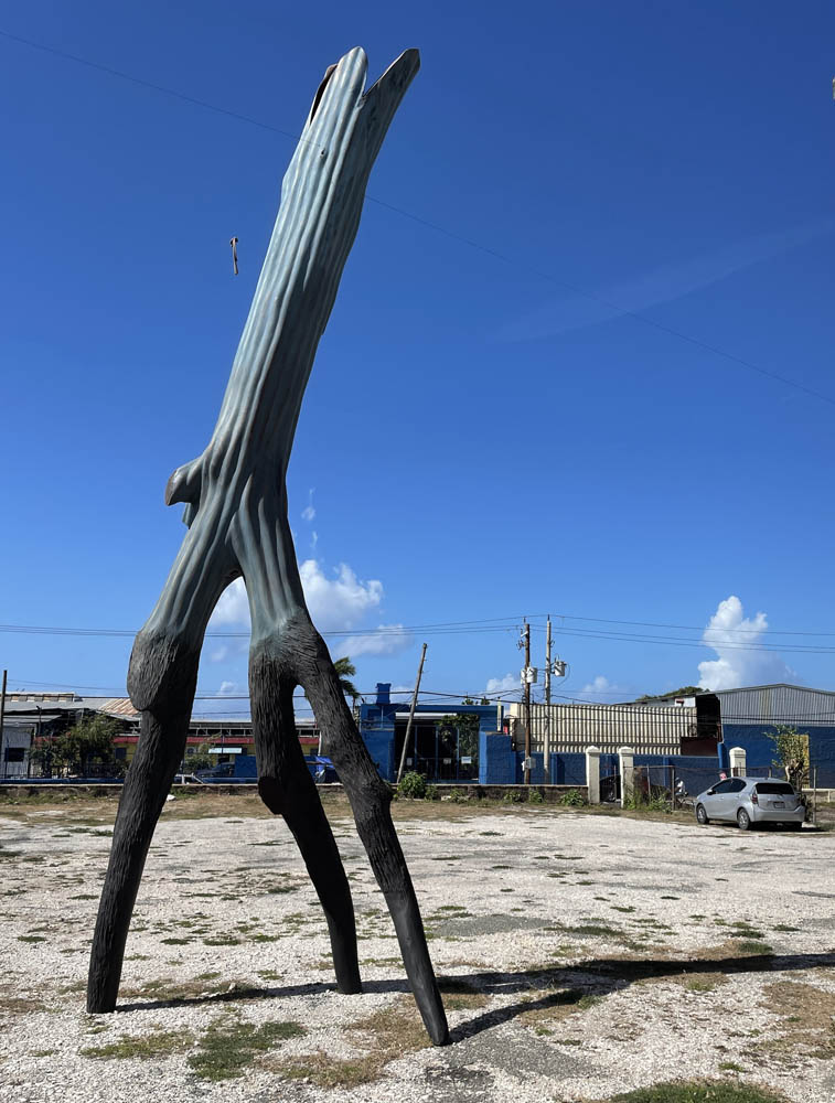 ZINC WALKING TREE, 2018, mahogany, 25’