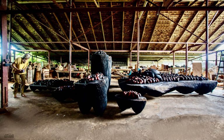 GUIDE THEIR WAY HOME, Altars Of Our Heart, Our Children, Our Children’s Children, 2021, guango, cedar, mahogany, 20’ x 30 ‘ x 7’, with Laura in studio